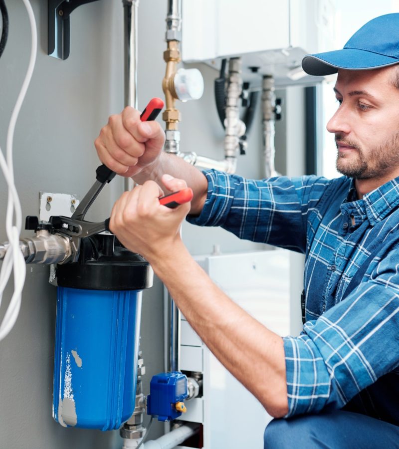 young-plumber-or-technician-installing-or-repairing-system-of-water-filtration.jpg young-plumber-or-technician-installing-or-repairing-system-of-water-filtration.jpg
